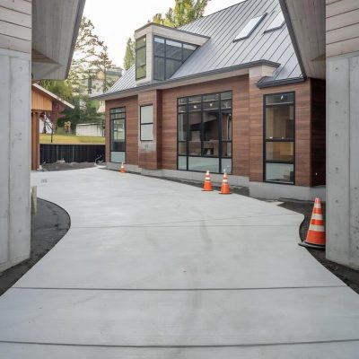 concrete-driveway-brand-new-residential-triplex-house